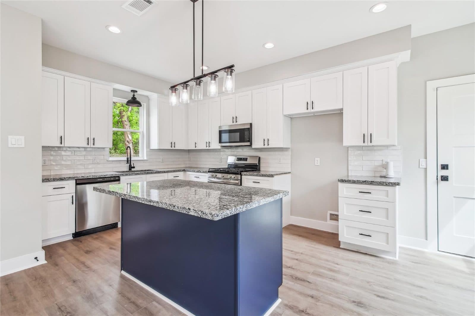 Acres Homes New Build — Kitchen with navy island, Acres Homes — Houston, TX