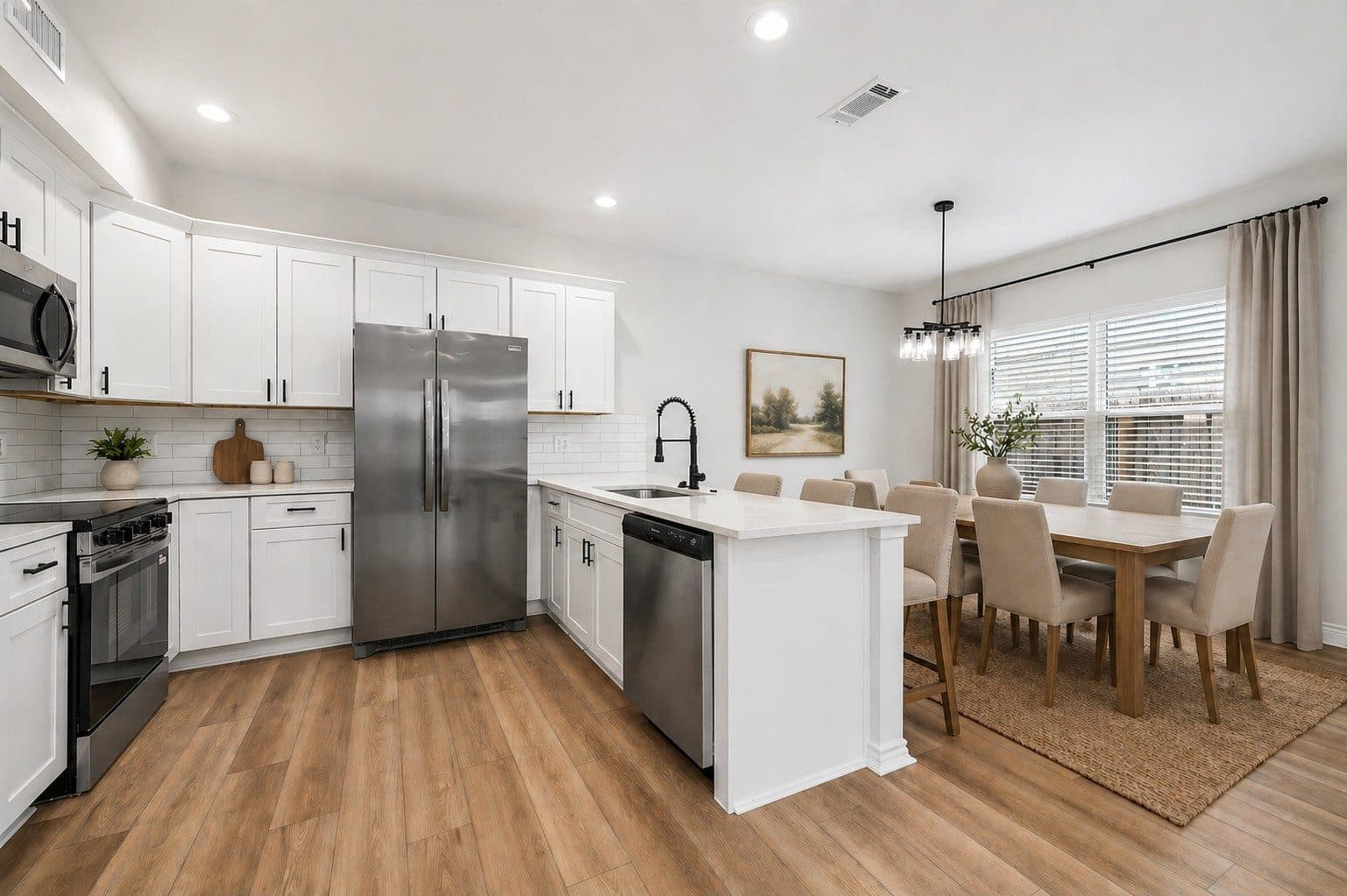 Fortune Street Duplexes — Kitchen & dining (staged), Acres Homes — Houston, TX